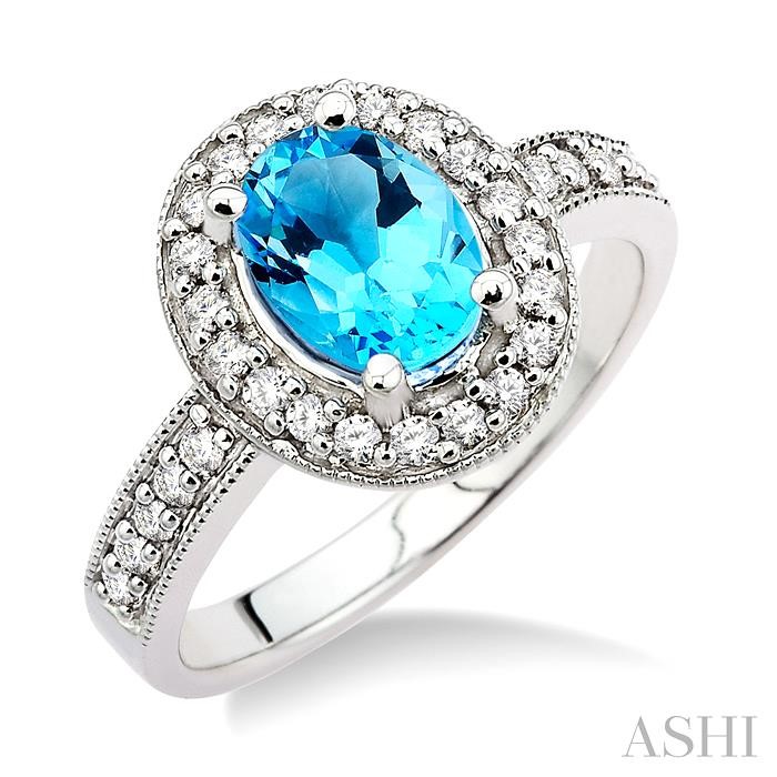 OVAL SHAPE GEMSTONE & HALO DIAMOND RING