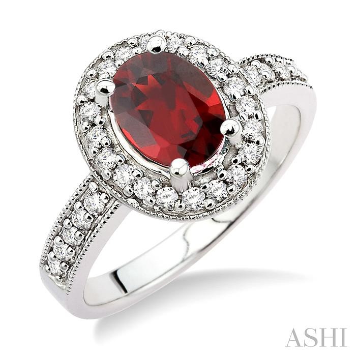 OVAL SHAPE GEMSTONE & HALO DIAMOND RING