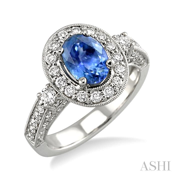 OVAL SHAPE GEMSTONE & HALO DIAMOND RING