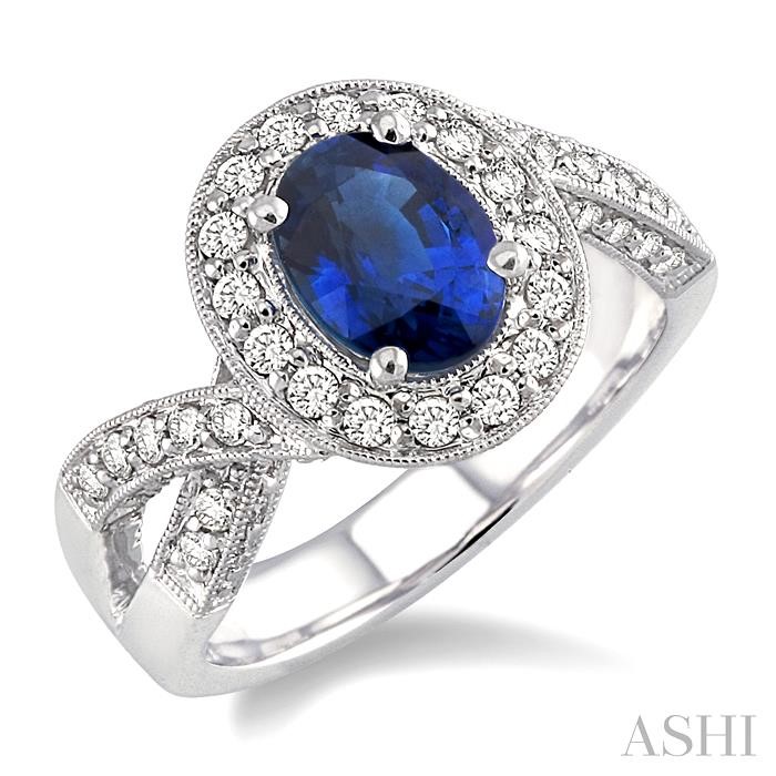 OVAL SHAPE GEMSTONE & HALO DIAMOND RING