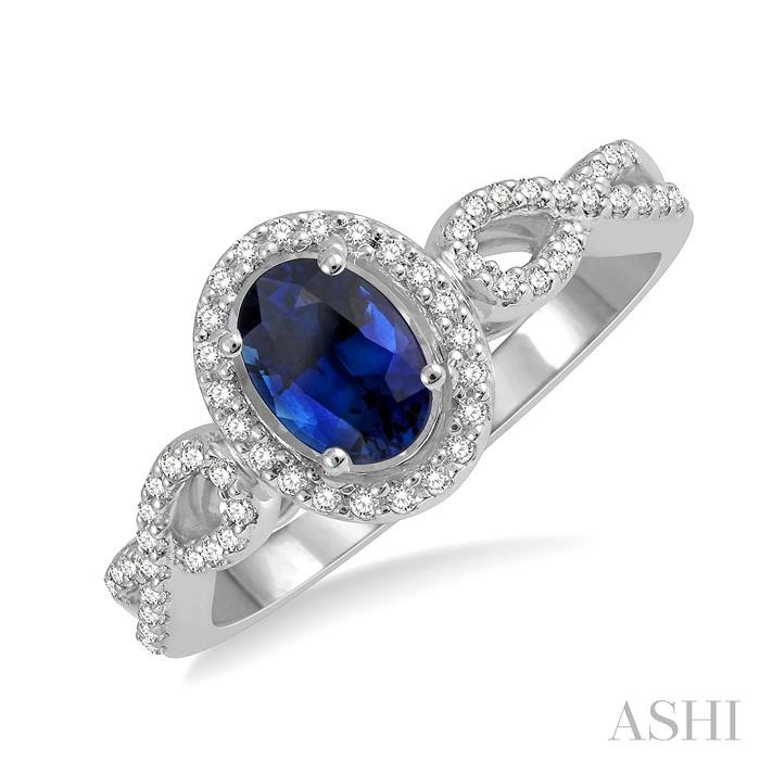 OVAL SHAPE GEMSTONE & HALO DIAMOND RING