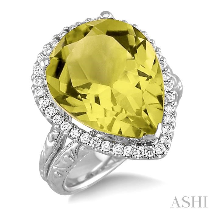 PEAR SHAPE GEMSTONE & HALO DIAMOND RING